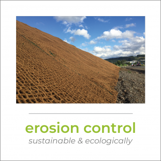 A little hill next to a street, covered with a coir fabric as erosion control